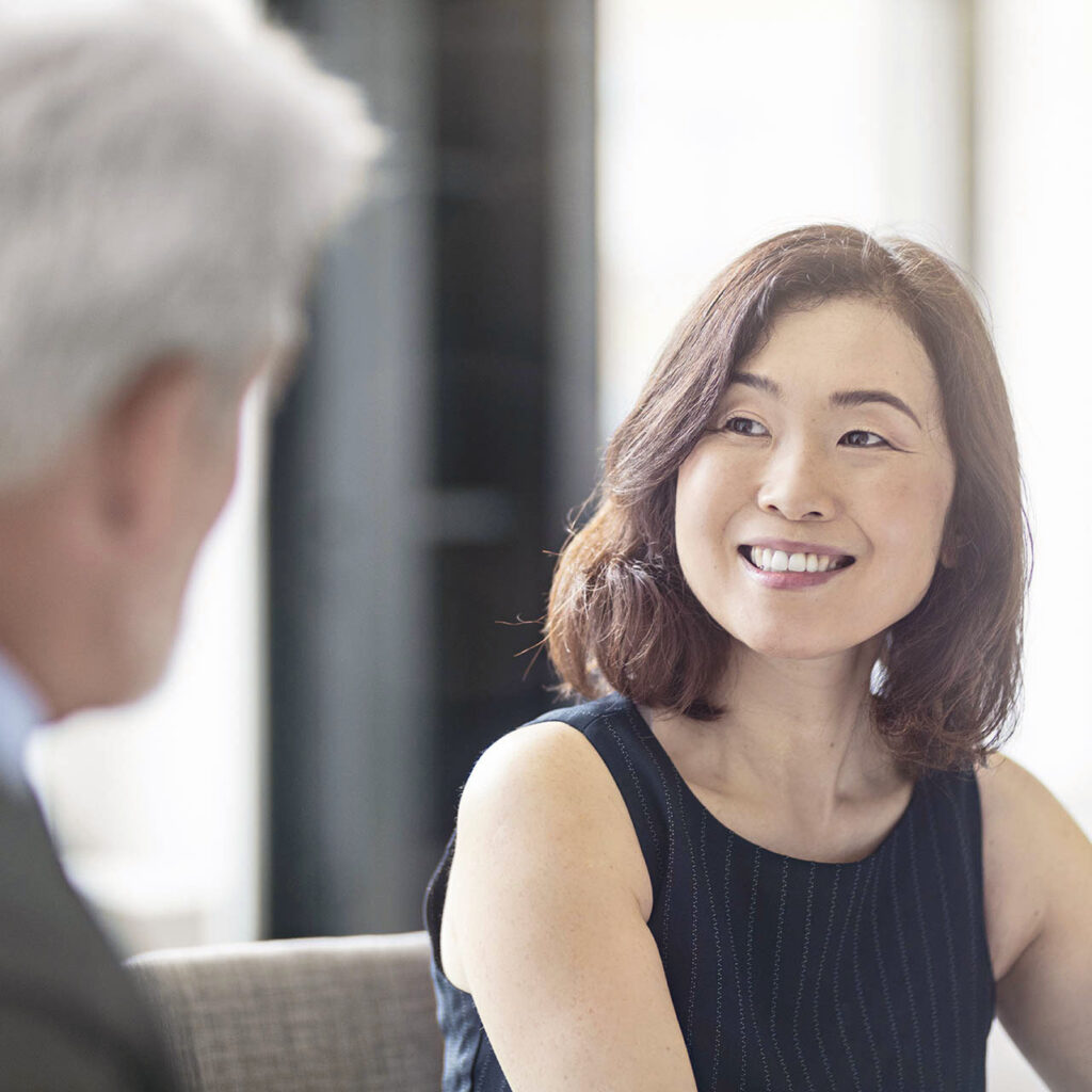 Woman in conversation talking about legal representation
